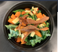 Our seasonal salad: a quinoa base with kale, spinach, apples, sweet potatoes, and fried parsnips.